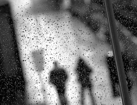 rain soaked window - City People