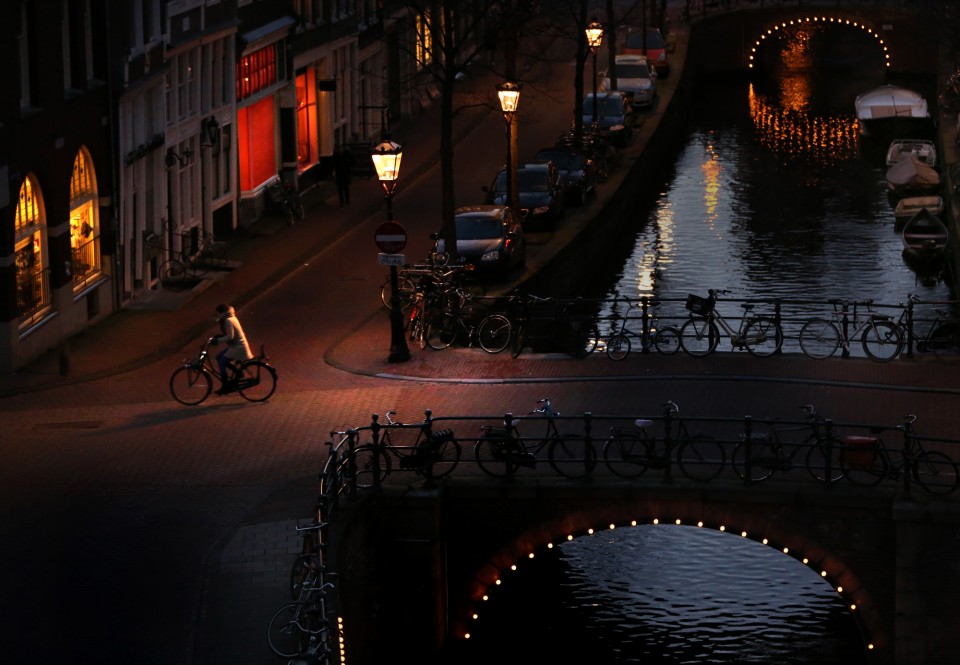 cyclist by canal