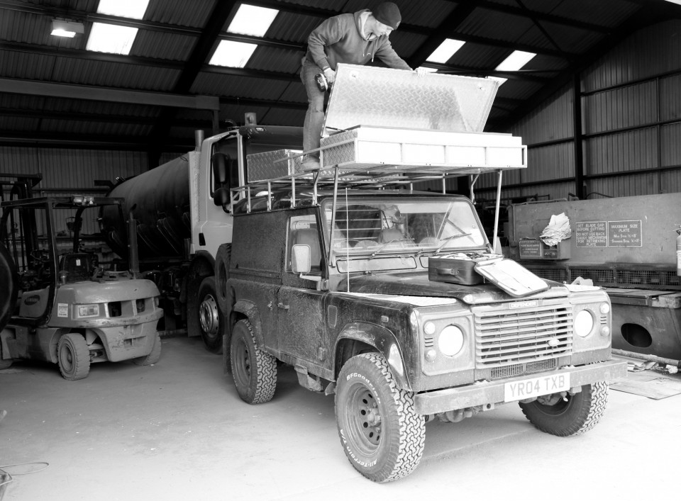 Land Rover with roof boxes