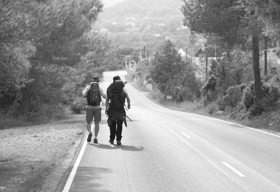 hikers on road