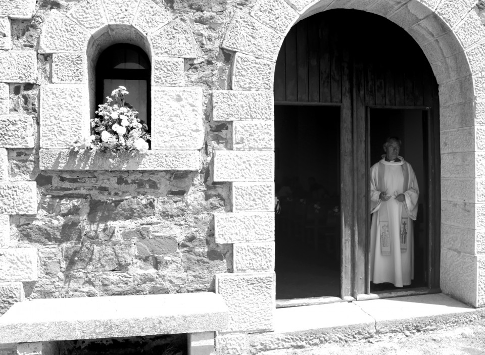 father in church doorway