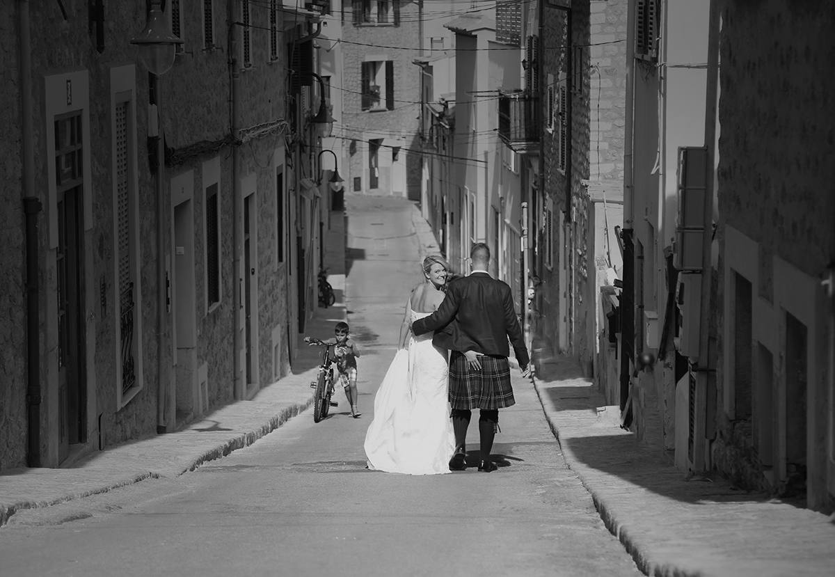 bride and groom in street