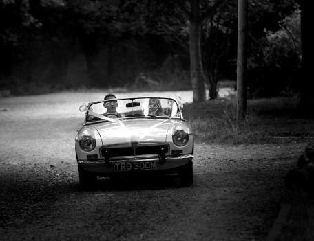 couple in classic car - The Wedding Car