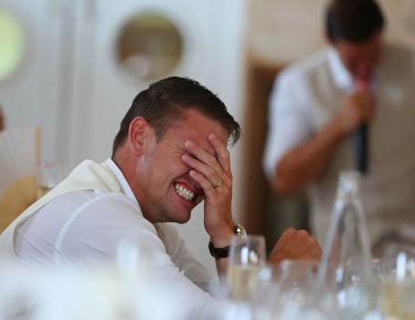 man holding his head in anguish - Favourite Wedding Faces