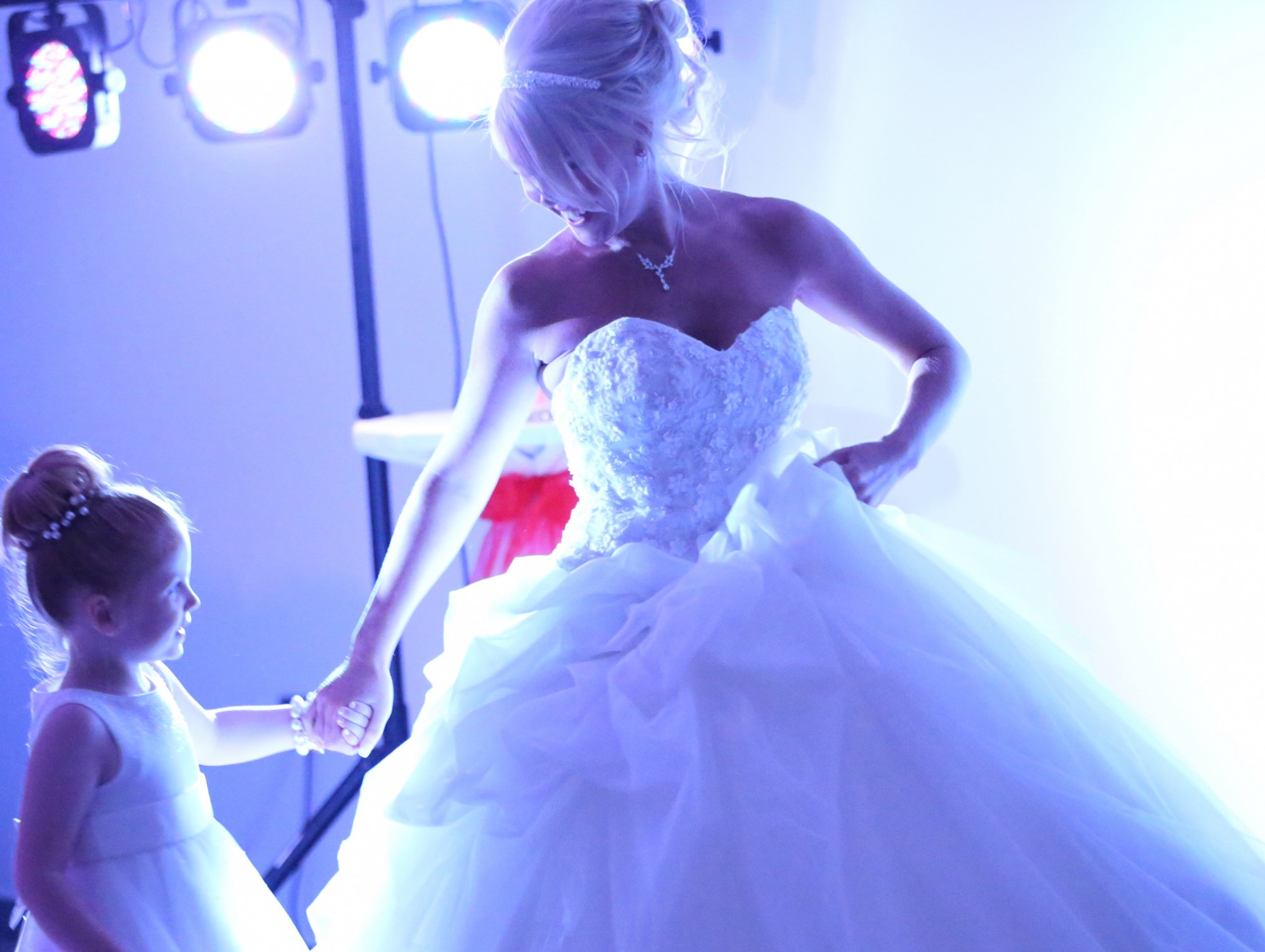 bride on dance floor with girl