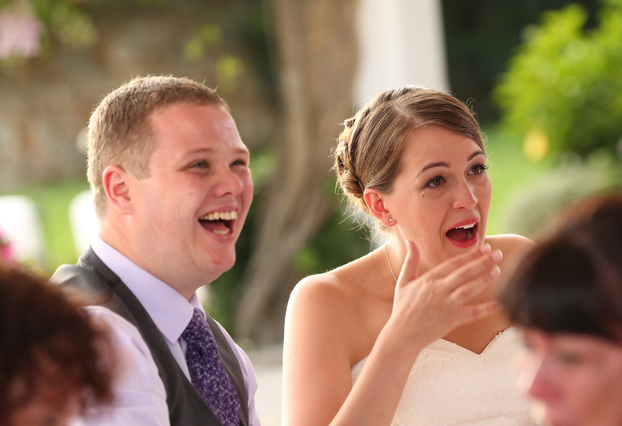 wedding couple at table