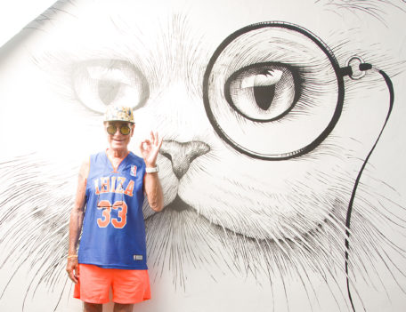 man next to wall art - Wedding Portraits