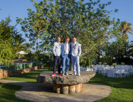 Three men on table - Can Gall Hotel