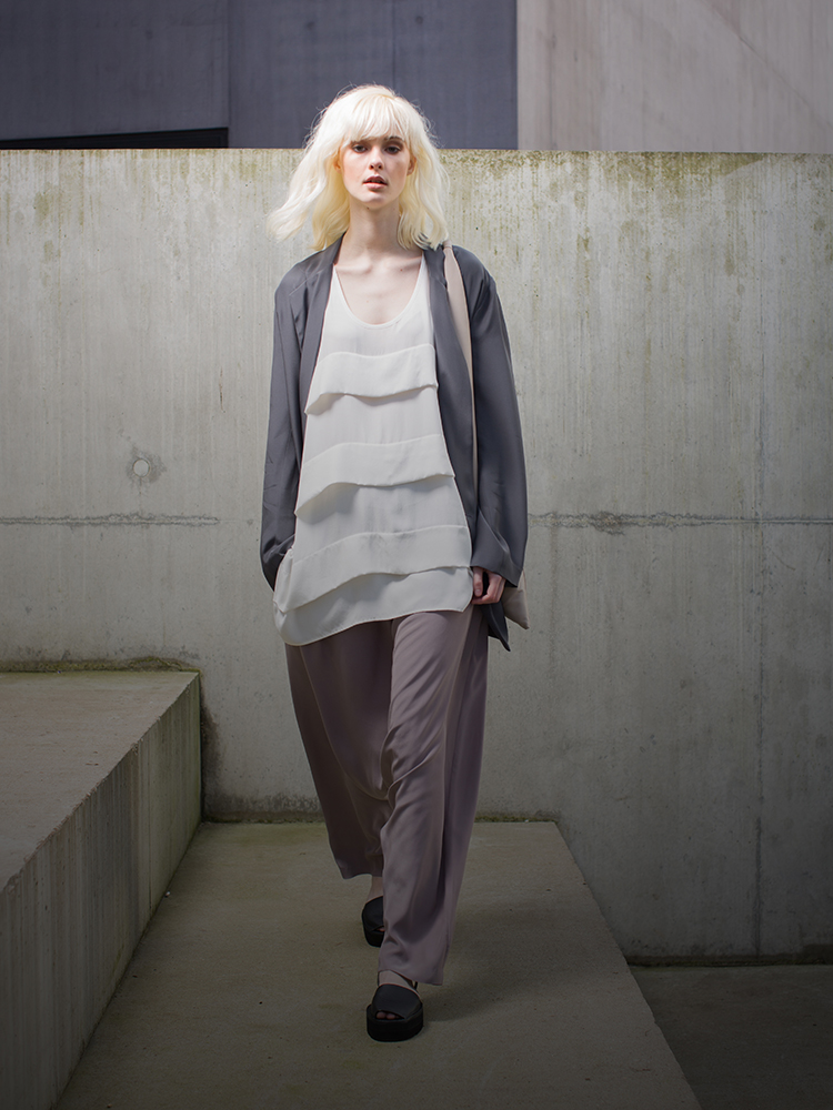 fashion model on concrete steps