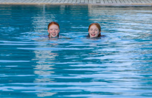 two girls in swimming pool