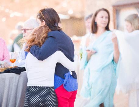 mother and daughter hug - Hotel Can Simoneta