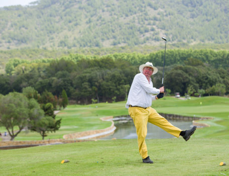 man on golf course - Hotel Can Simoneta