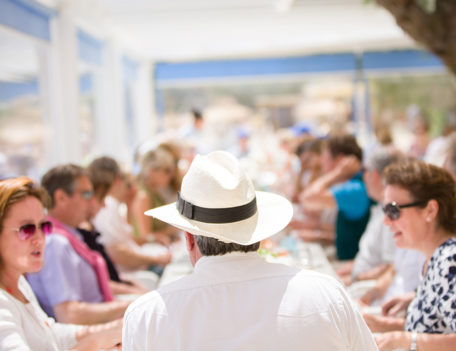 people seated at table - Hotel Can Simoneta