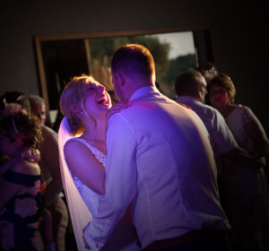 bride and groom dancing