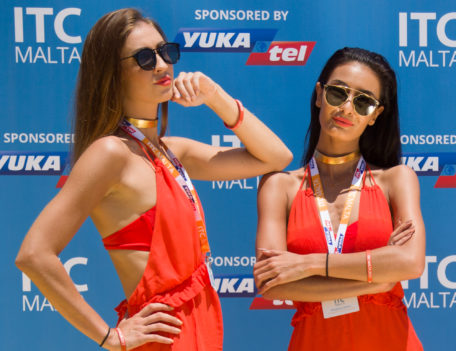 models by branded stand - ITC Malta