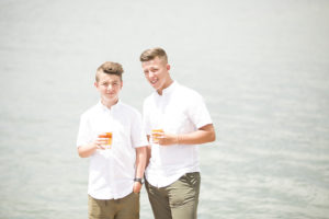 two boys by water