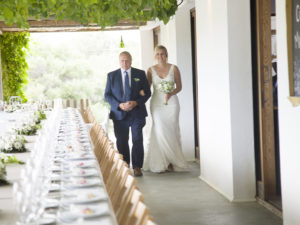 bride and father approach