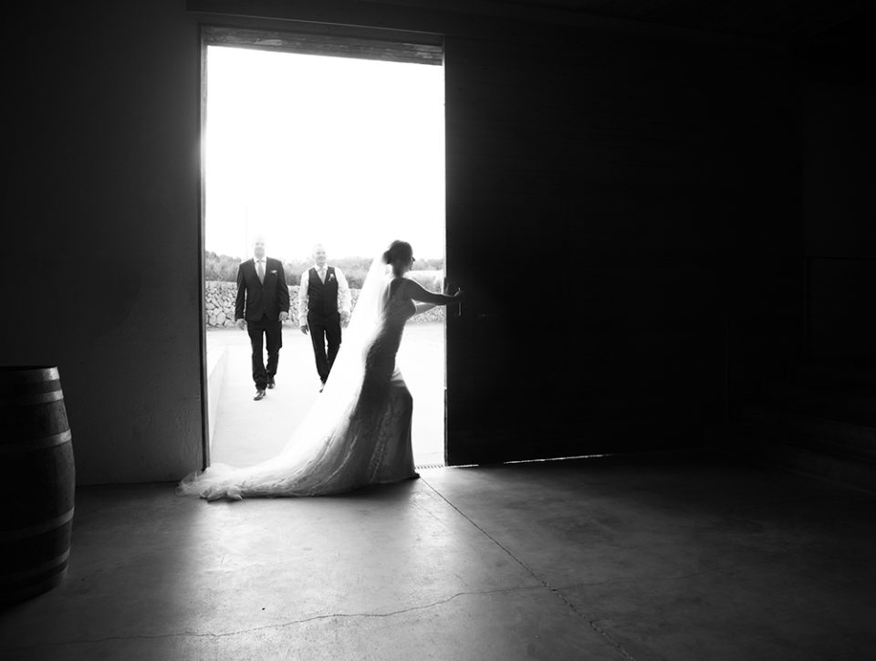 bride pushes sliding door back