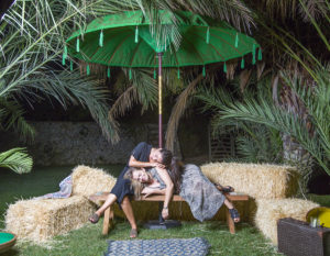 two women on hay bails