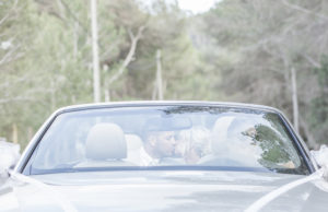 Couple in car kiss