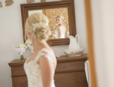 bride looking in mirror - Son Mir