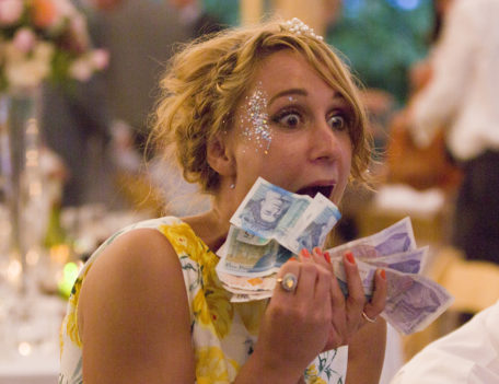 woman with money - English Wedding