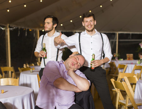 man asleep in chair - English Wedding