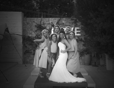 bride with bridesmaids on table - Elixir Shore Club