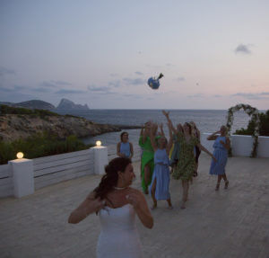 bride throws the bouquet