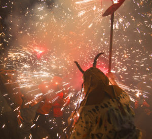 demon with fireworks