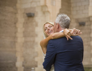 couple hugging at church