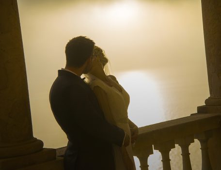 couple kiss on balcony - The Bride at Son Marroig