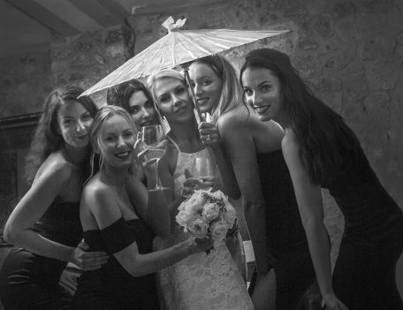 bride and bridesmaids under parasol - The Bride at Son Marroig