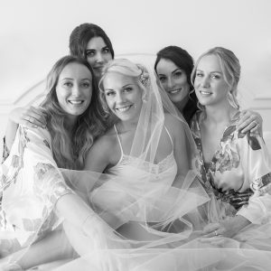 bride on bed during bridal preparations