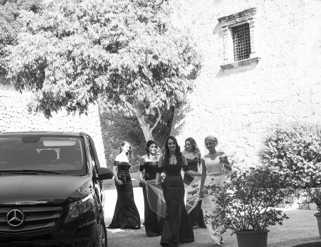 bride with her bridesmaids alighting the wedding car - The Bride at Son Marroig