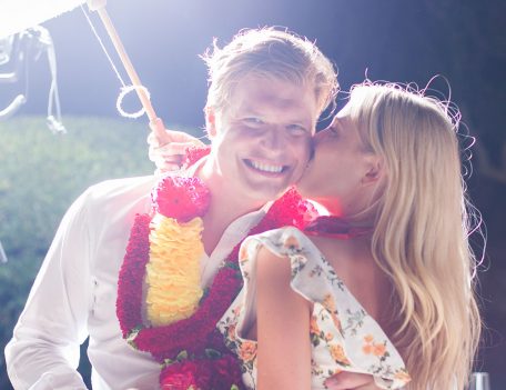 girl kissing boy on cheek - Santa Barbara