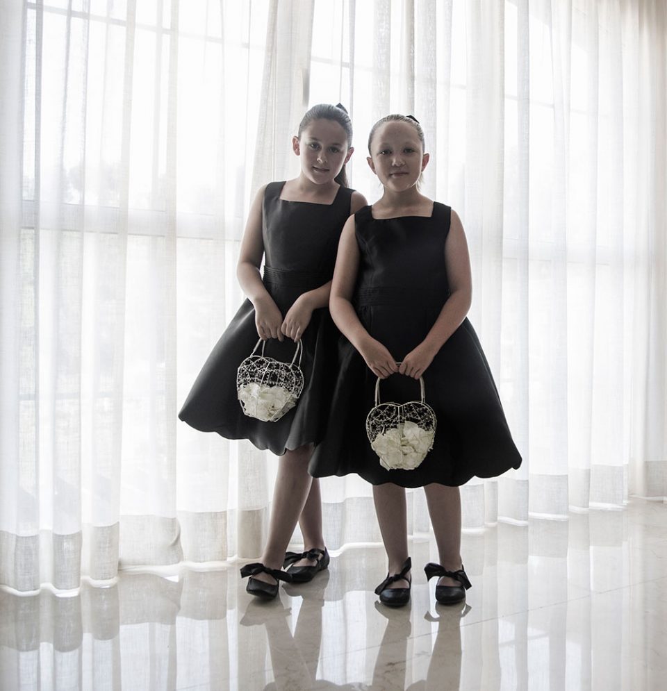 two bridesmaids in black