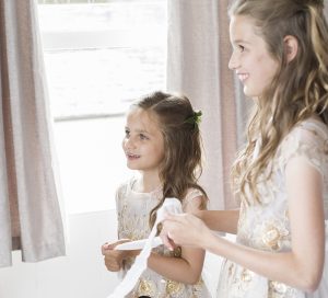 bridesmaids admire bride