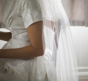 bride sat on old chair