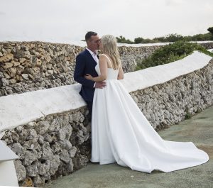 bride and groom kissing