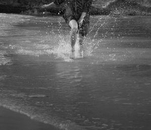 woman's legs in water