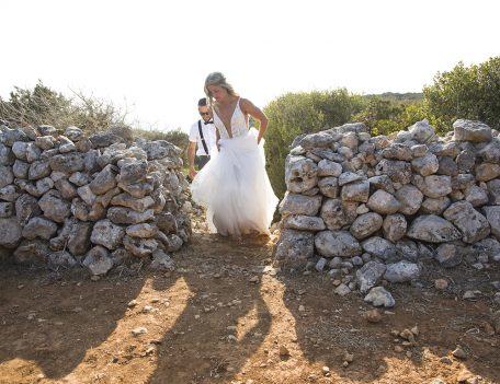 Bride walking through gate - Villa Binisegarra